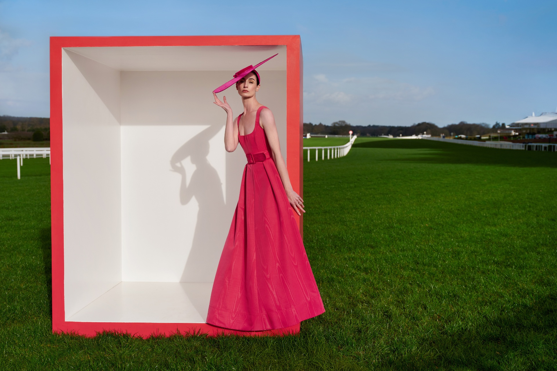 Woman wearing pink dress and hat | Royal Ascot Handbook 2026