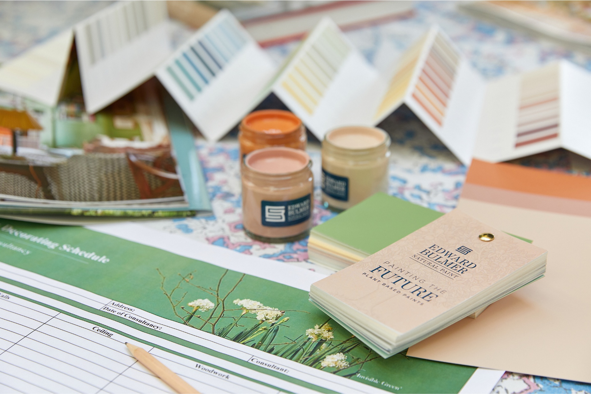 Paint samples set on work bench for Edward Bulmer colour consultation