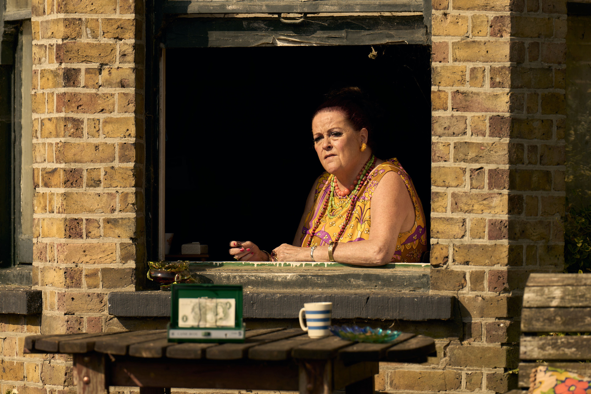 Priscilla (KATE ROBBINS) in California Avenue.