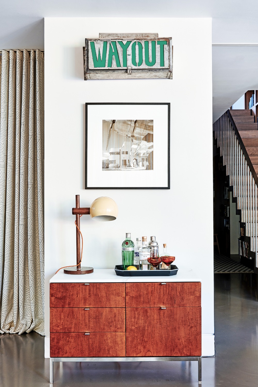 Cabinet pressed against thin wall