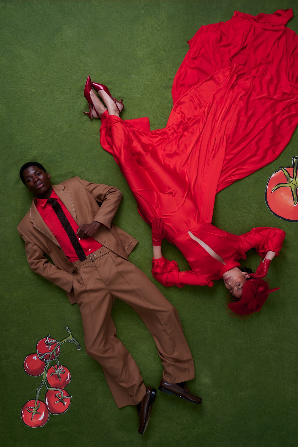 Man and woman in red outfits