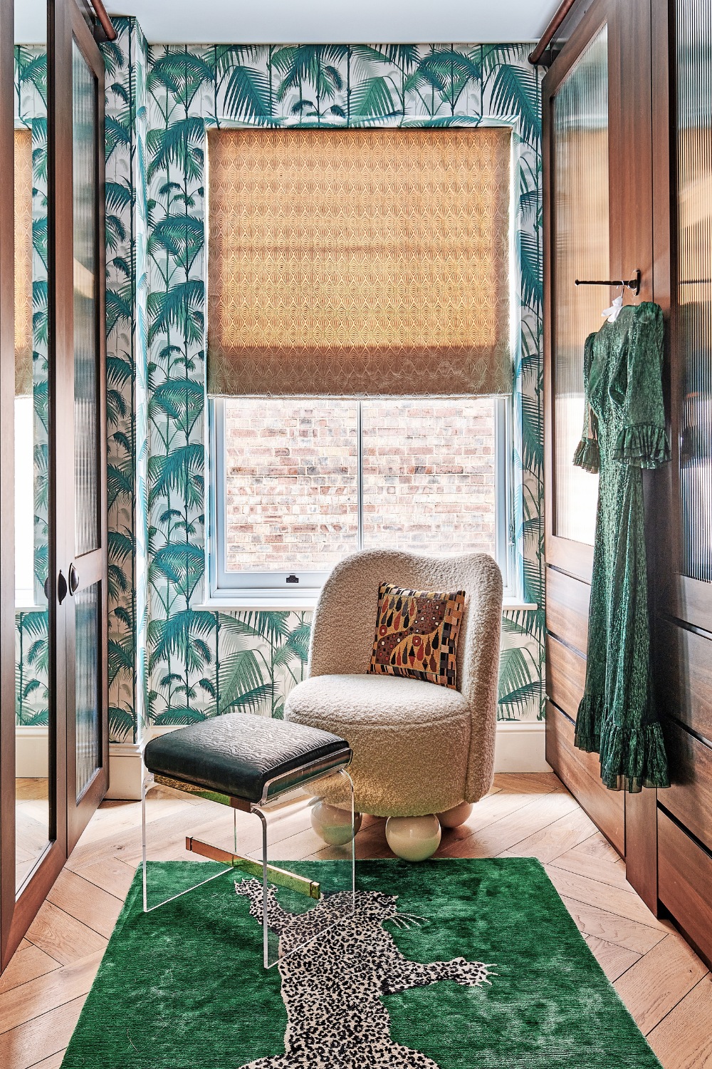 Wood-toned dressing room with green accents