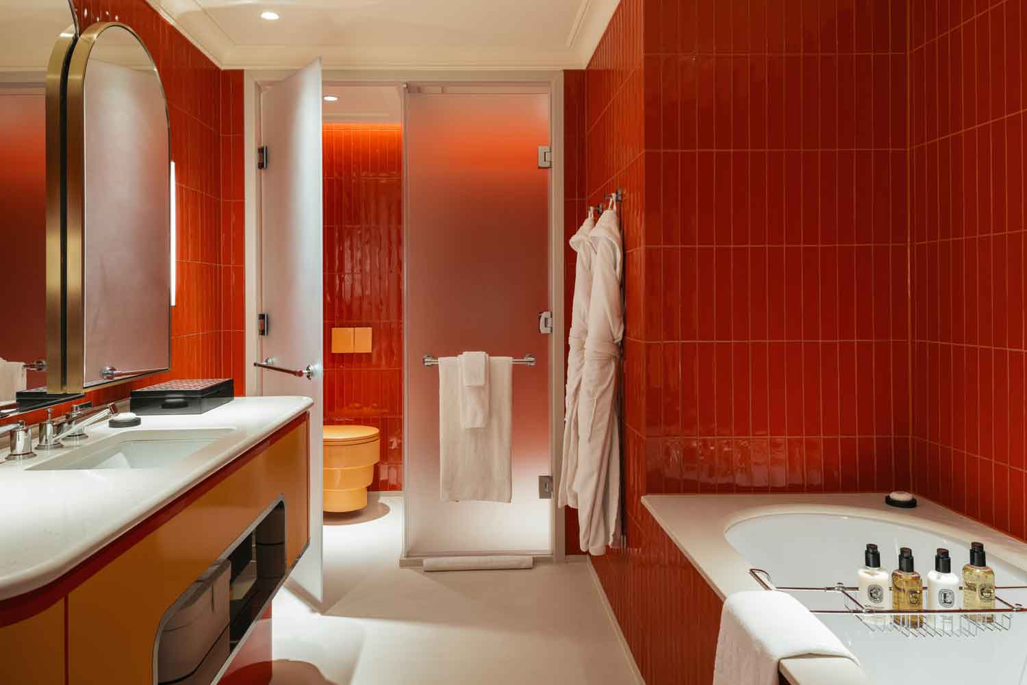 the orange bathroom in Suite 70 at Sofitel London St James