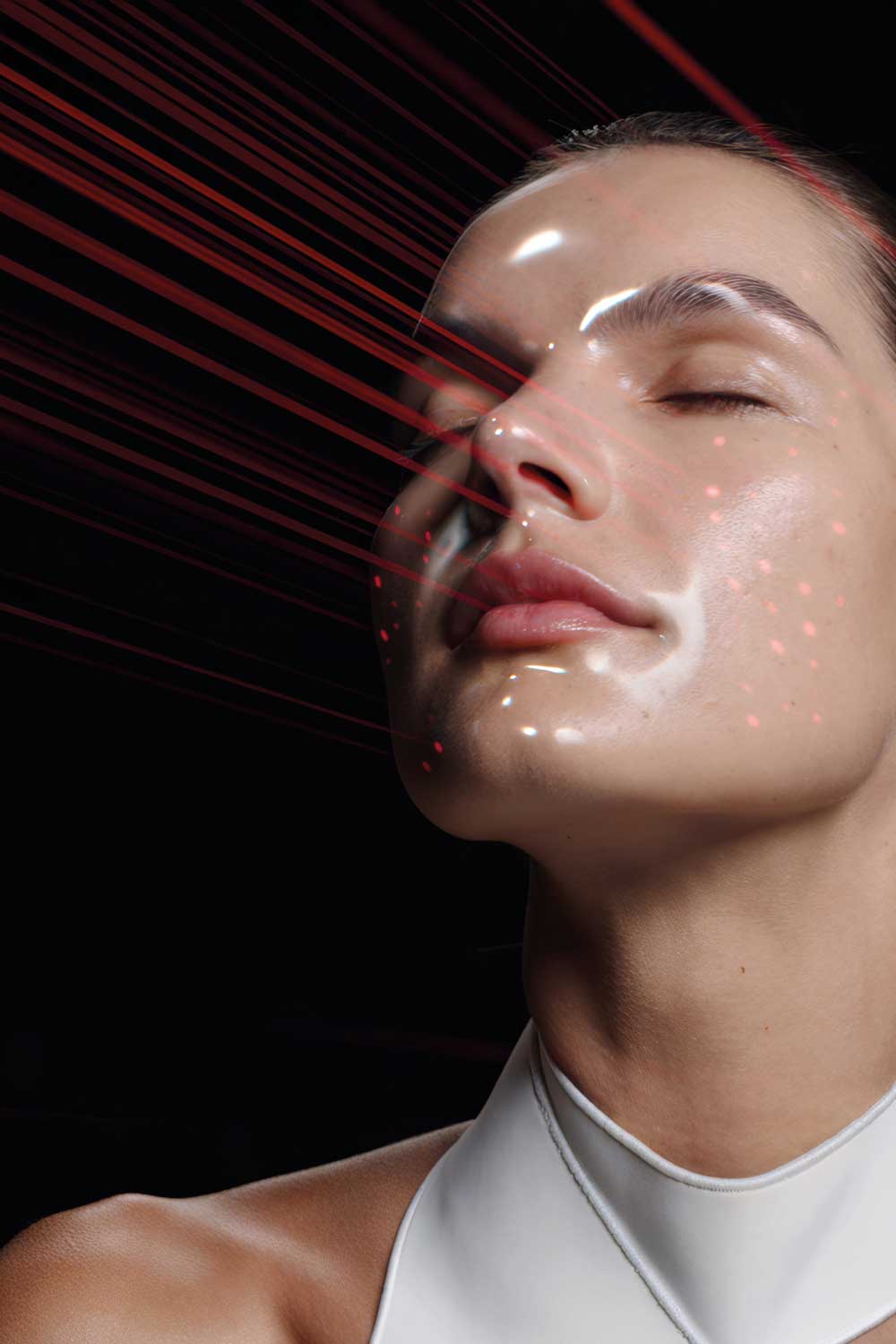 model with lasers on her face