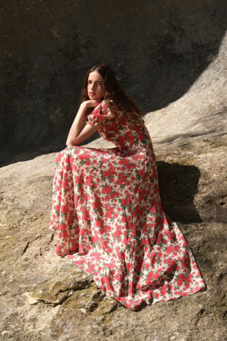 Woman in red floral dress