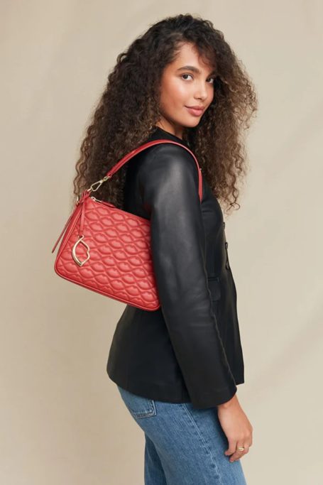 Woman with red handbag