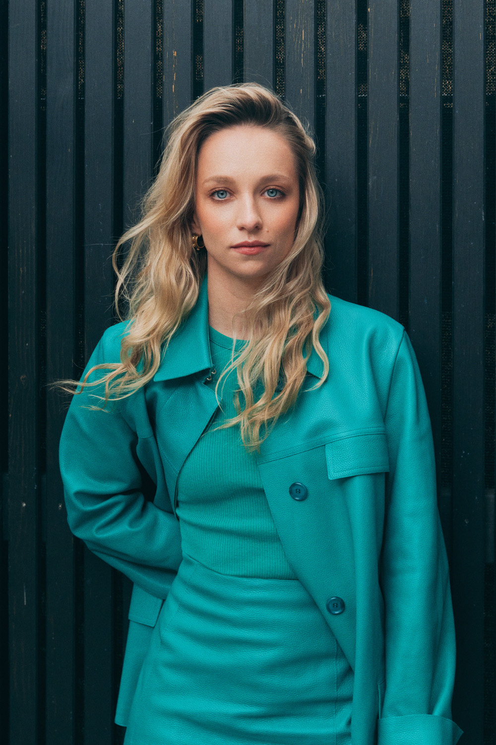 British actress Molly Windsor in a turquoise dress and matching jacket