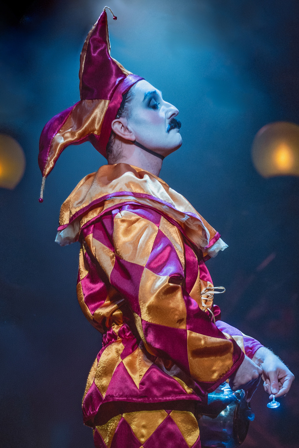 A performer dressed as a jester