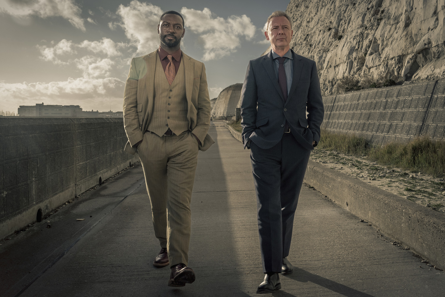 RICHIE CAMPBELL as DS Branson and JOHN SIMM as DS Roy Grace in Grace series 6.