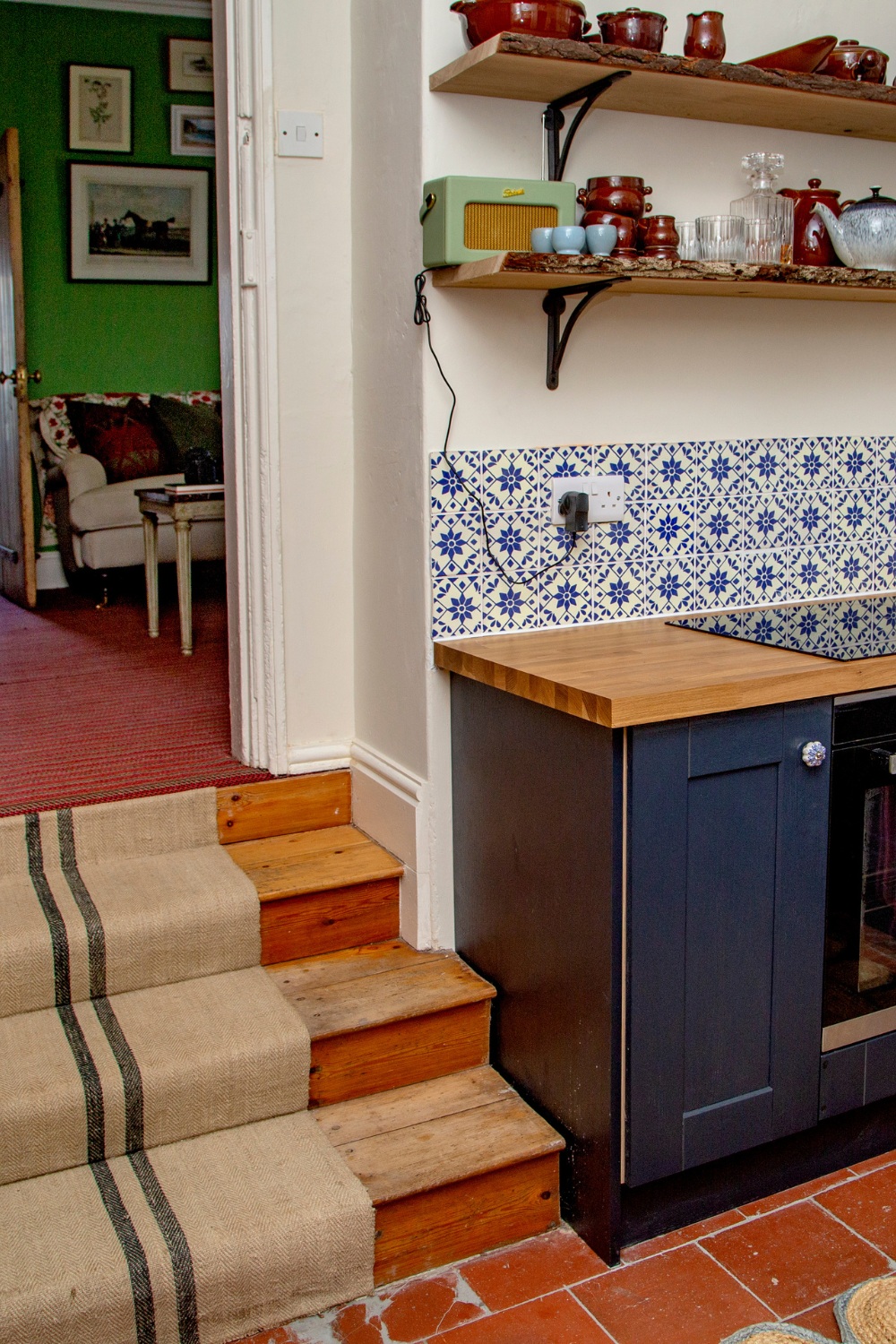 Steps leading from kitchen up to sitting room