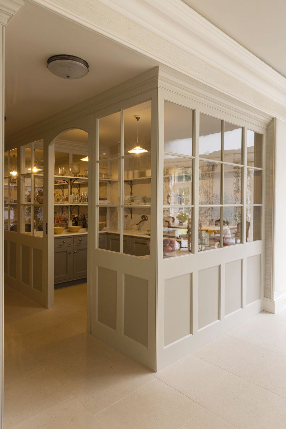 A glass-fronted pantry