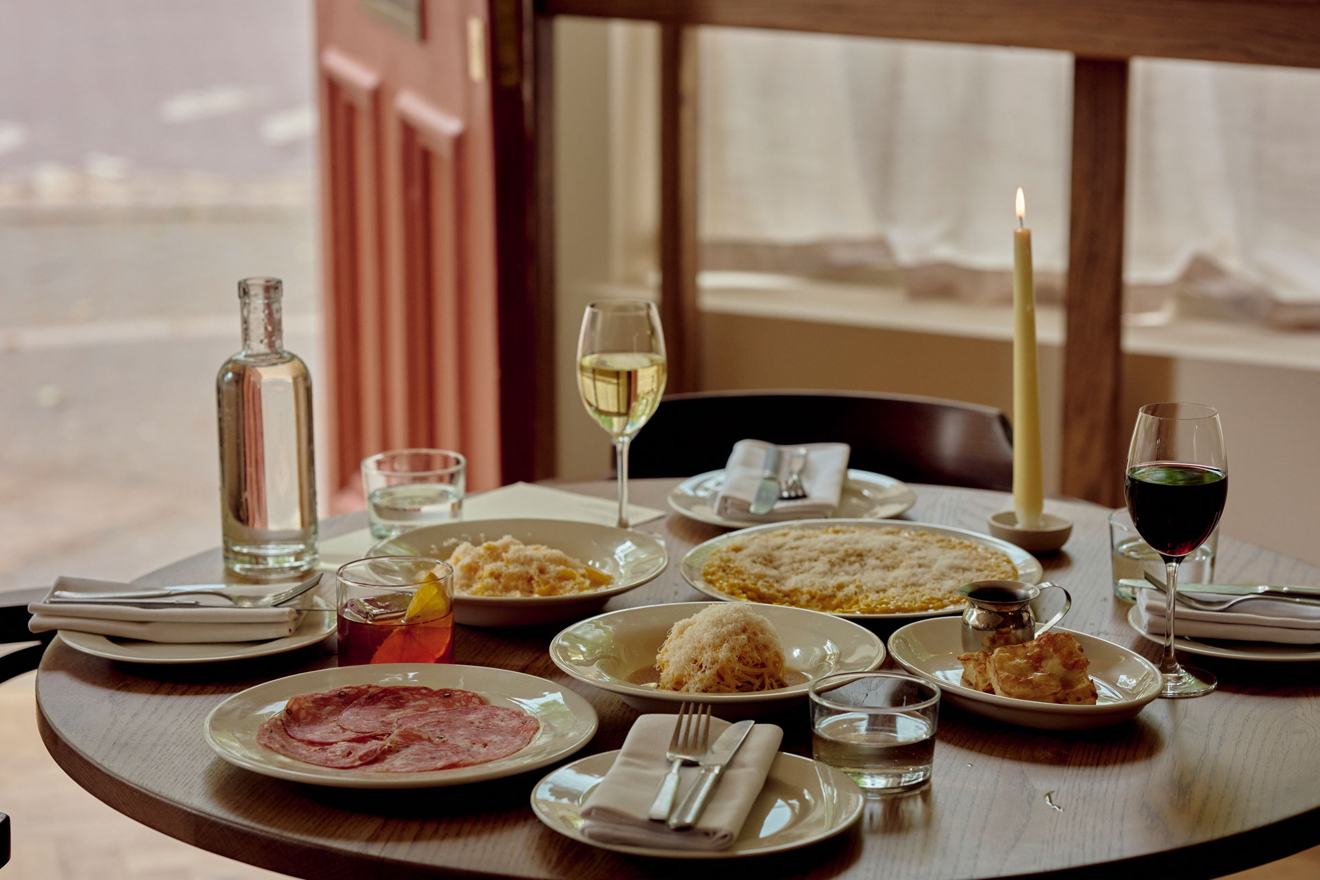 Plates of food on the table at Ornella restaurant