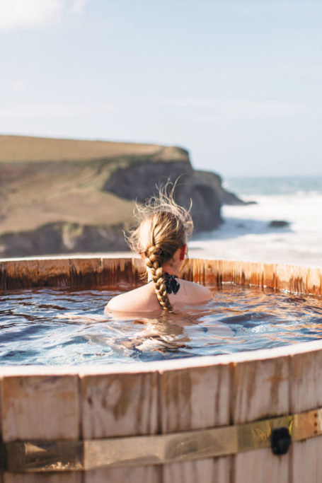 Woman in a hot tub at The Scarlet