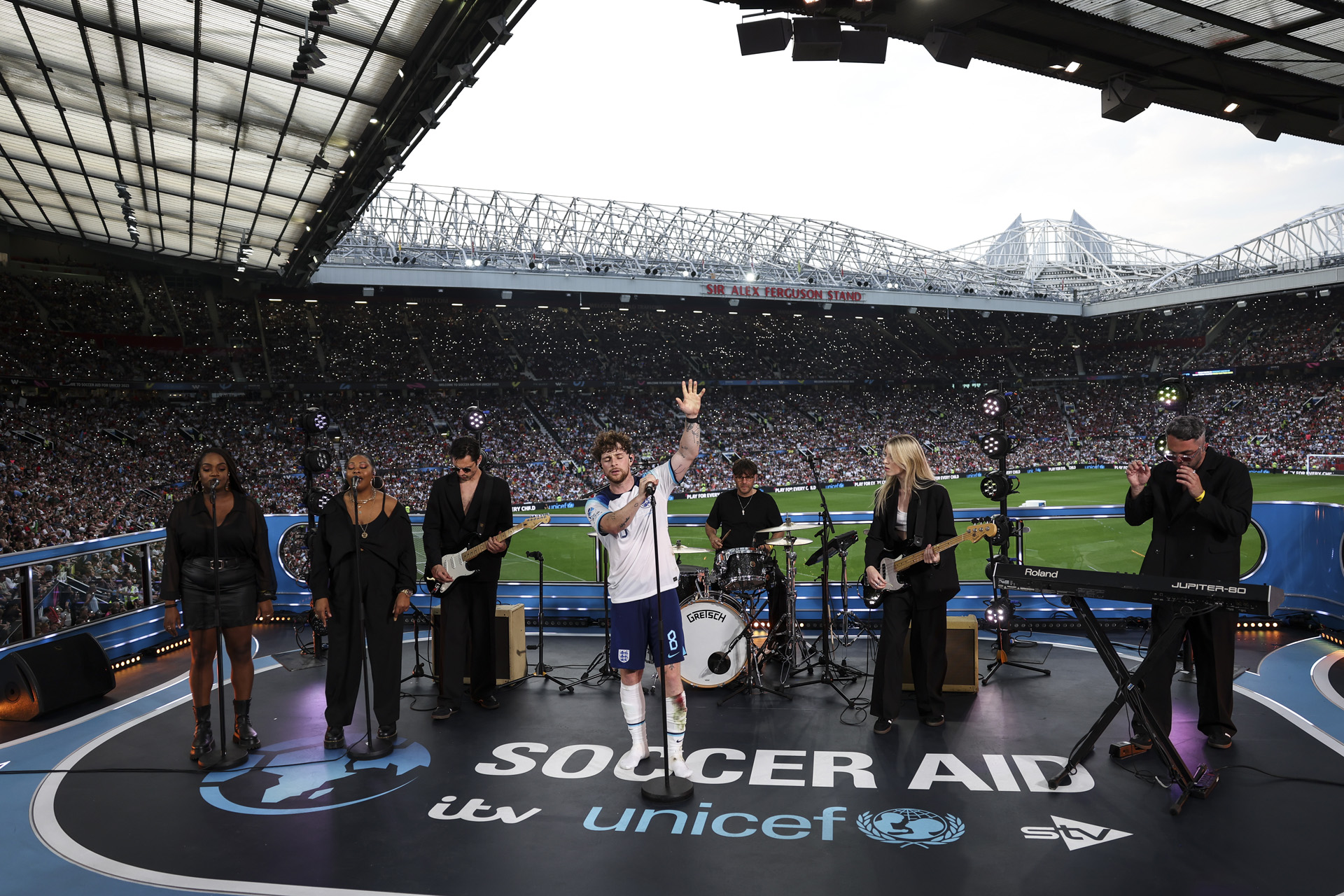 Tom Grennan preforms at half time during Soccer Aid for UNICEF 2023 taking place on Sunday 12th June at the Old Trafford, Manchester