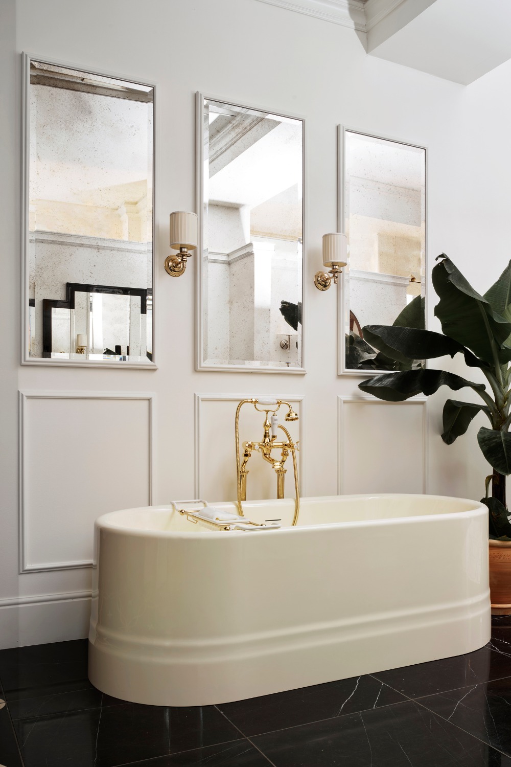 Cream bathroom with freestanding bath