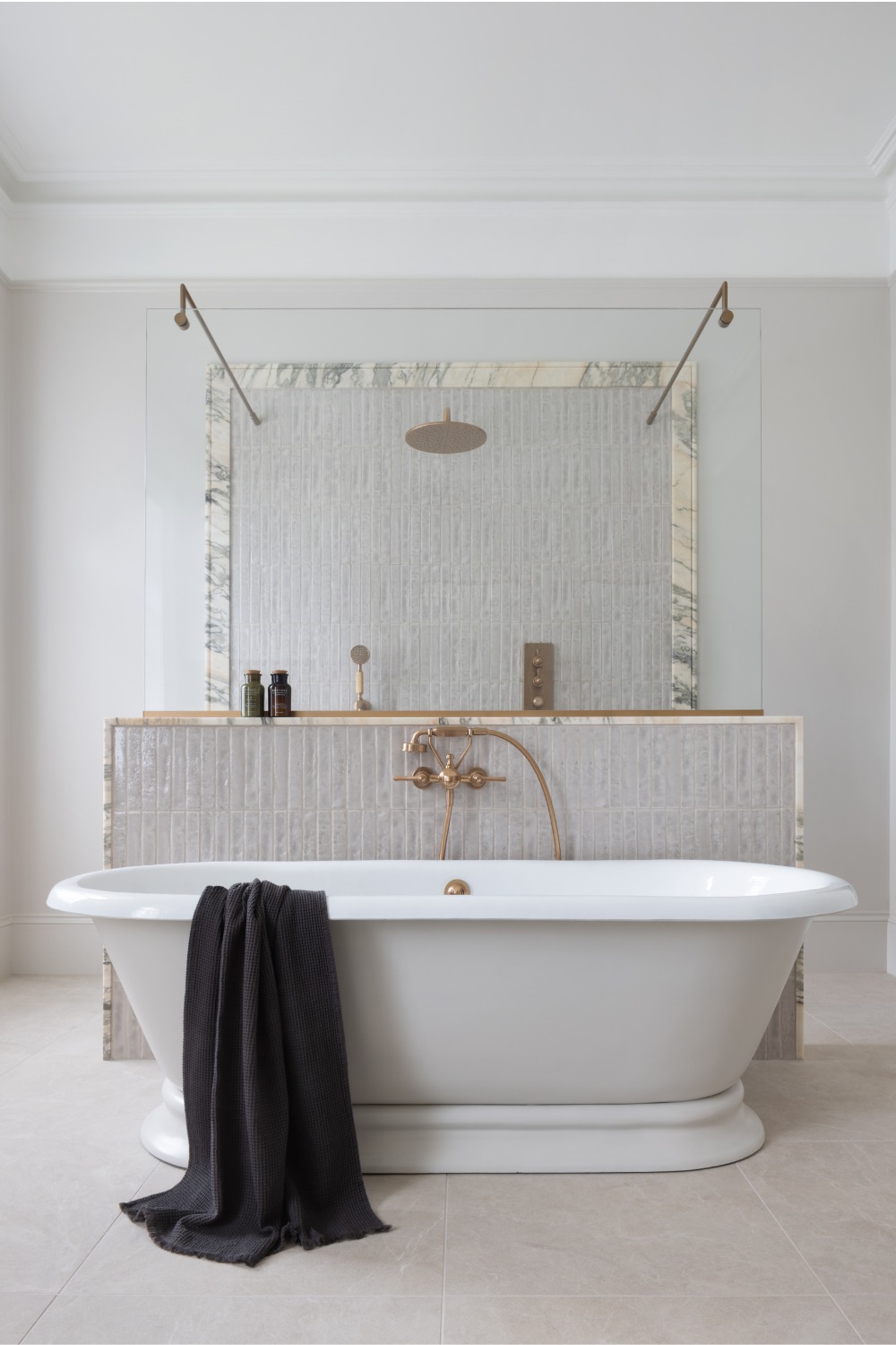 Bath with divider and marble shower