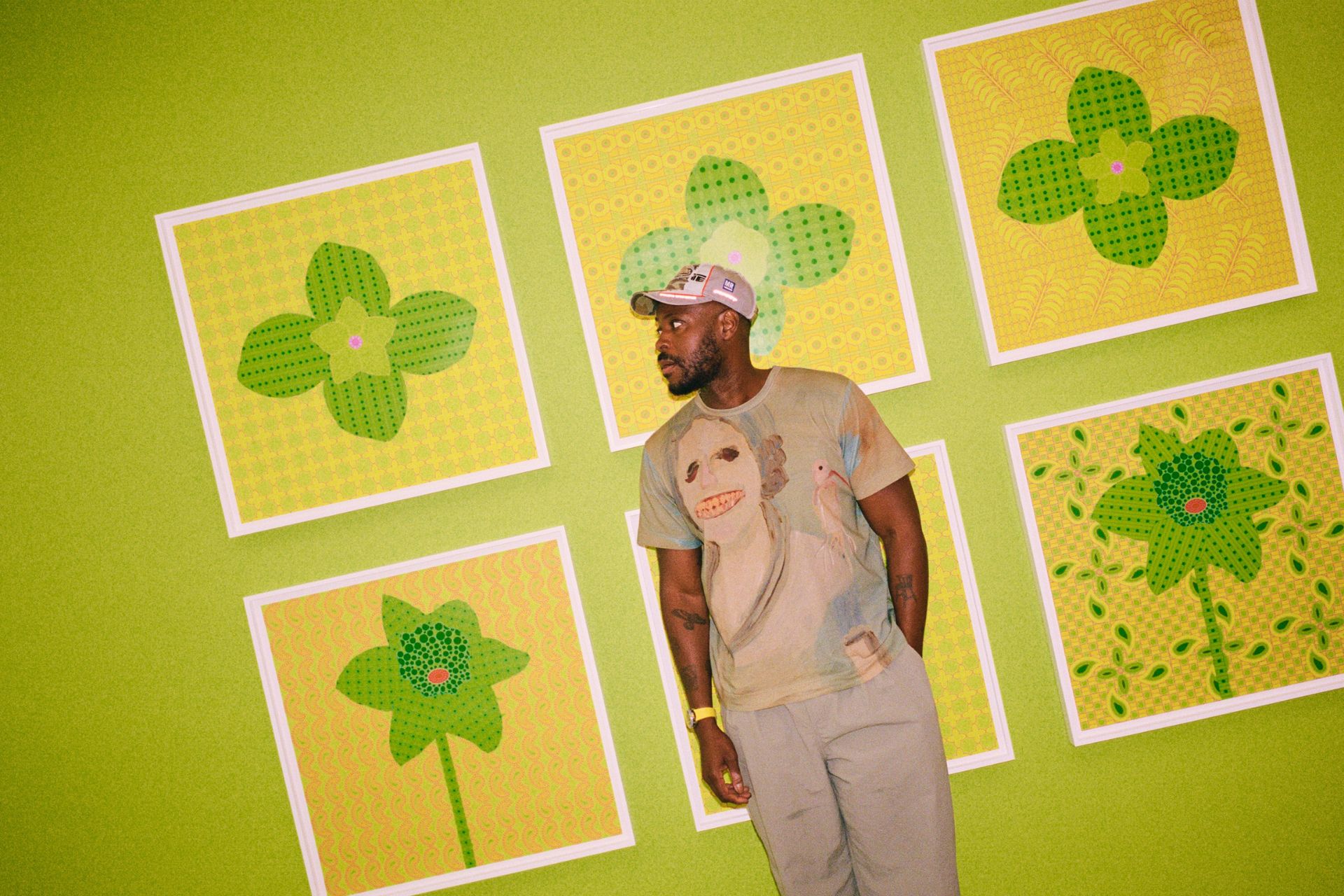 Yinka Ilori in front of Screenprints
