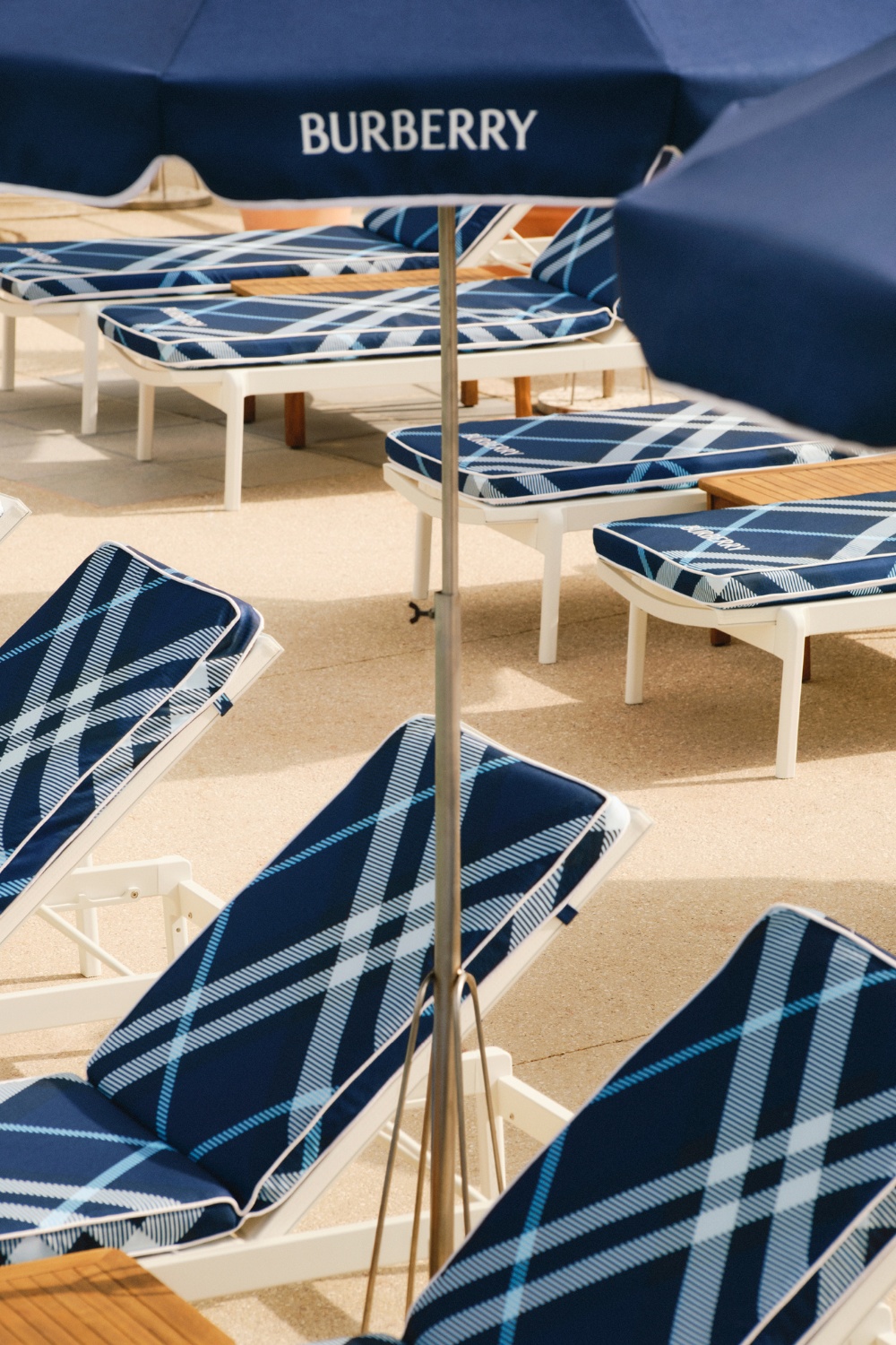 Blue check Burberry sun loungers at Hôtel Belles Rives | designer beach clubs