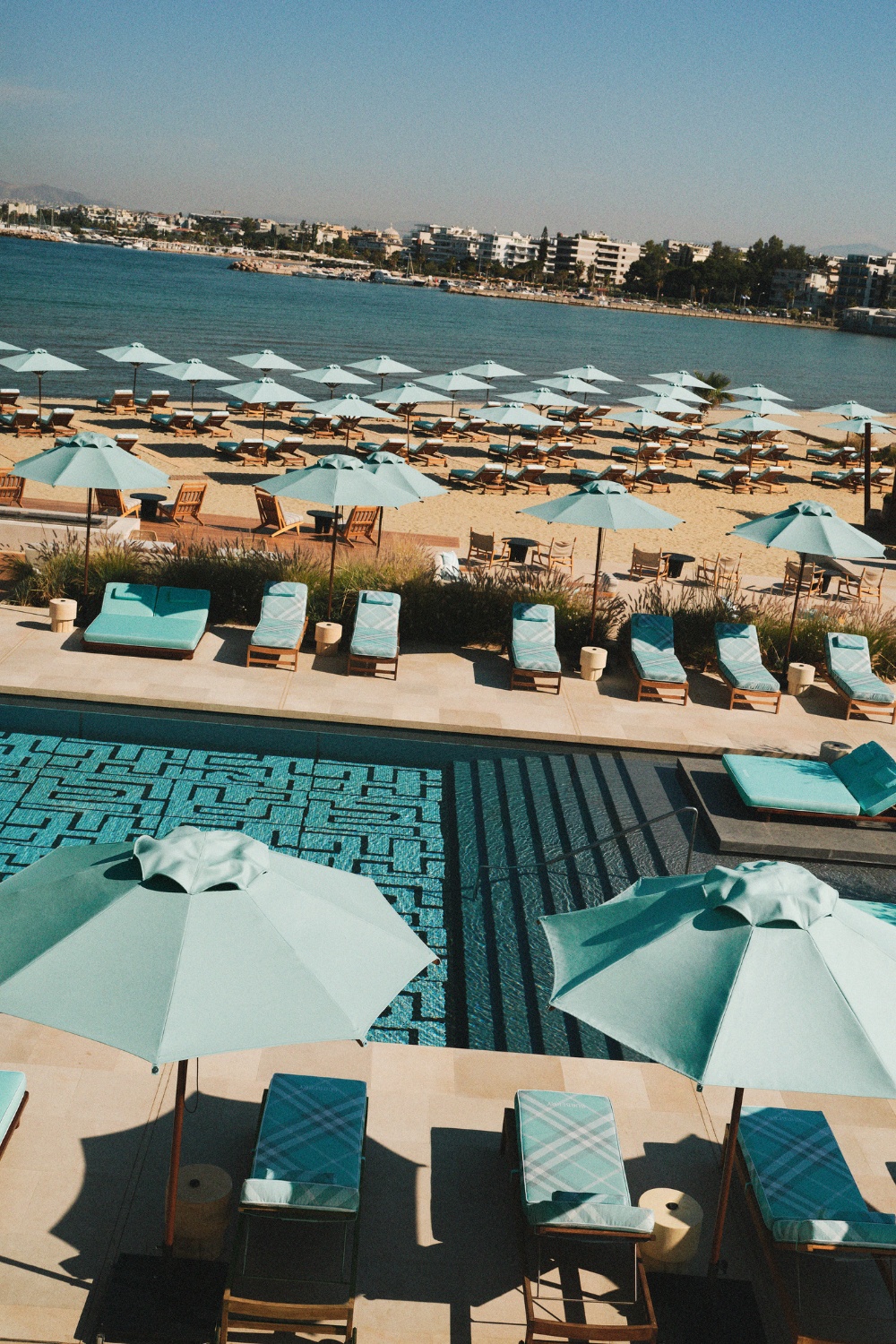 Blue Burberry parasols and sun loungers at One&Only Aesthesis