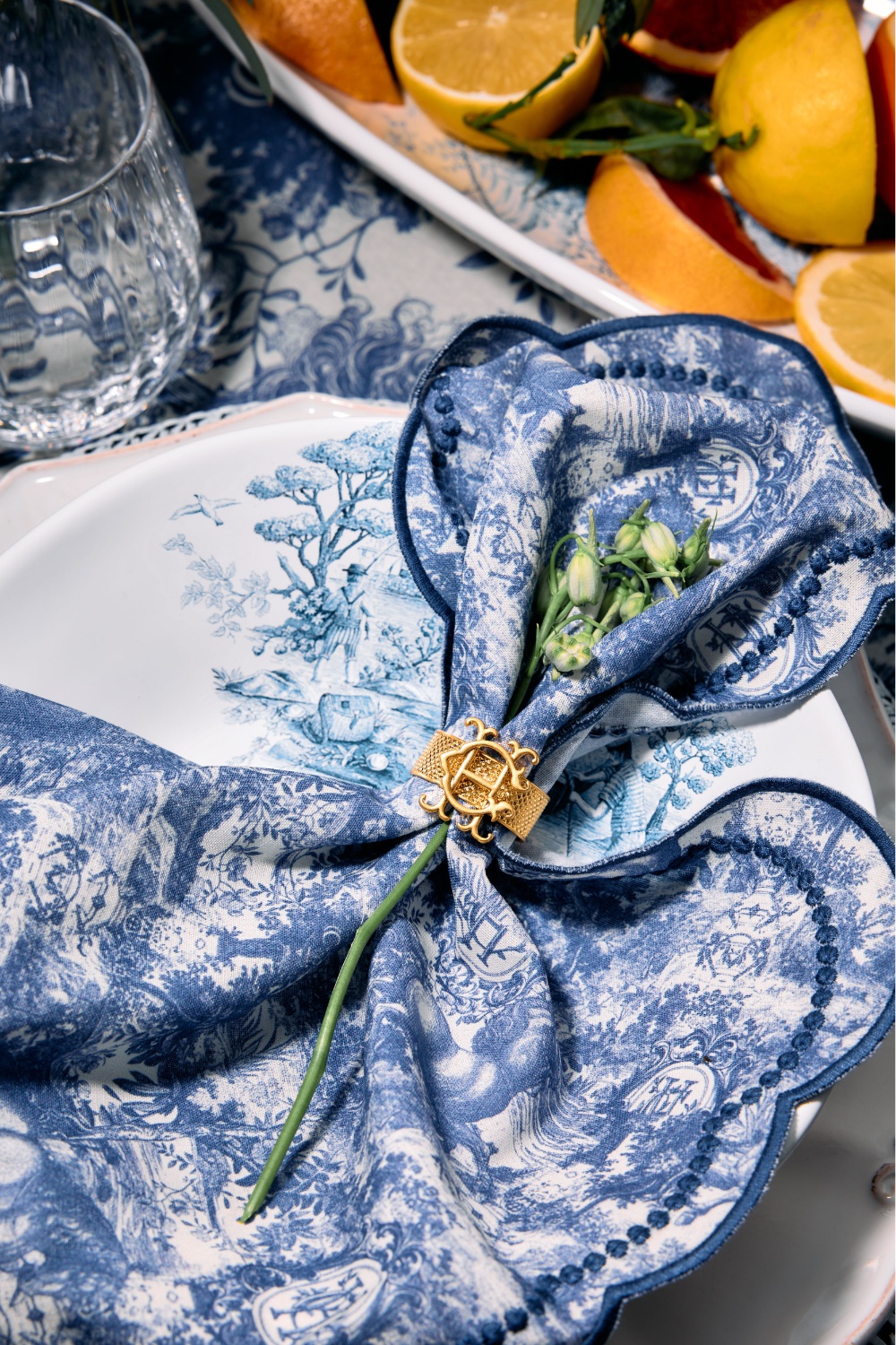 Blue Holland Cooper napkin set on plate