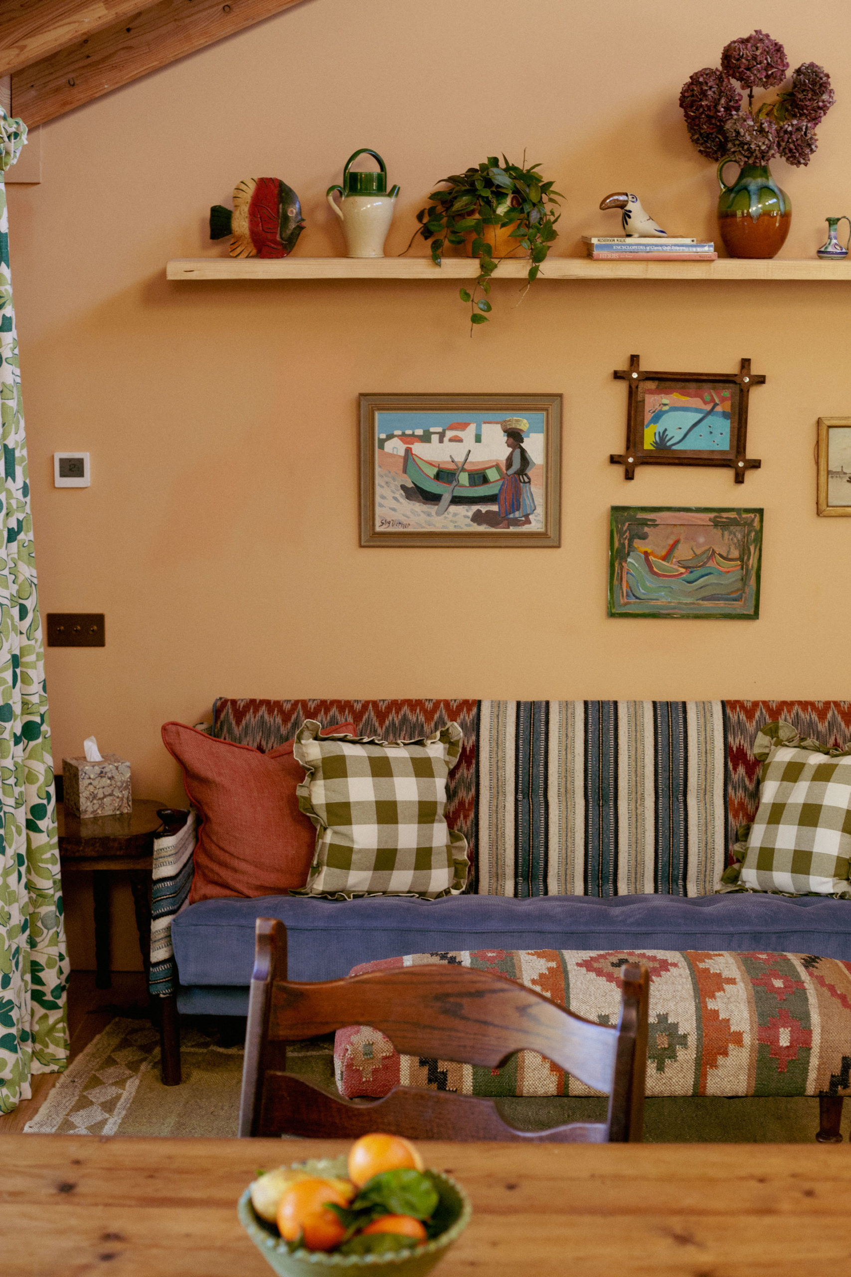 Colourful sofa with art at Glebe House
