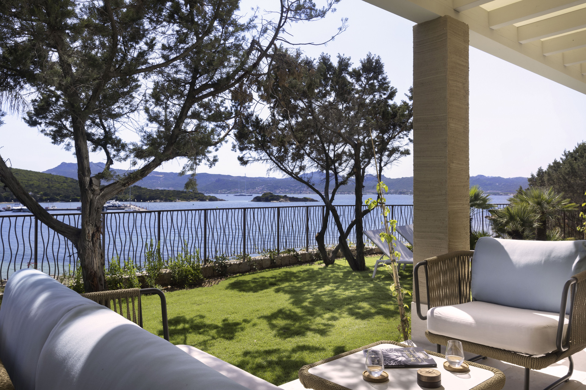 A Beach Suite at 7Pines with a grassy terrace and sea views