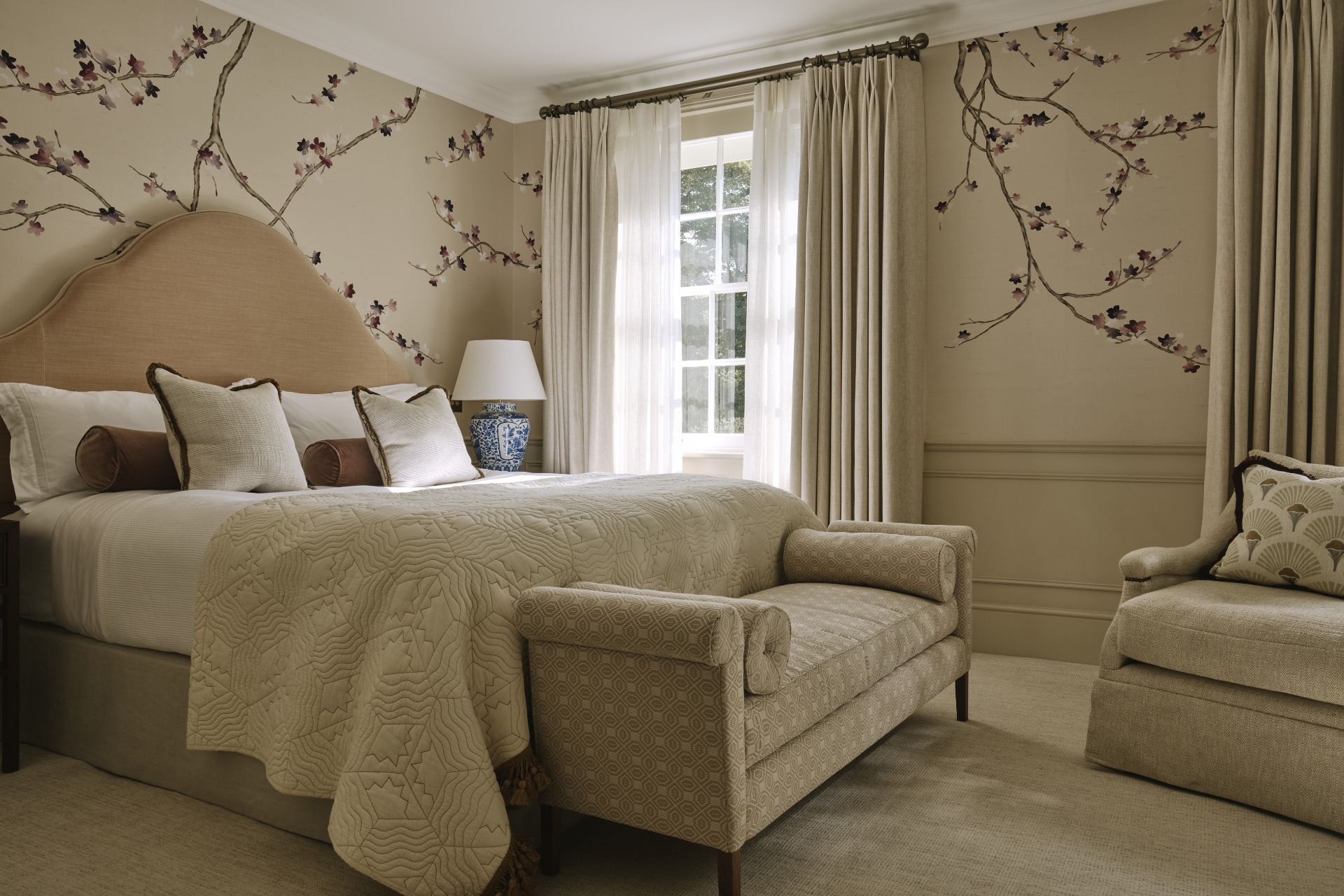 Master bedroom with cherry blossom wallpaper