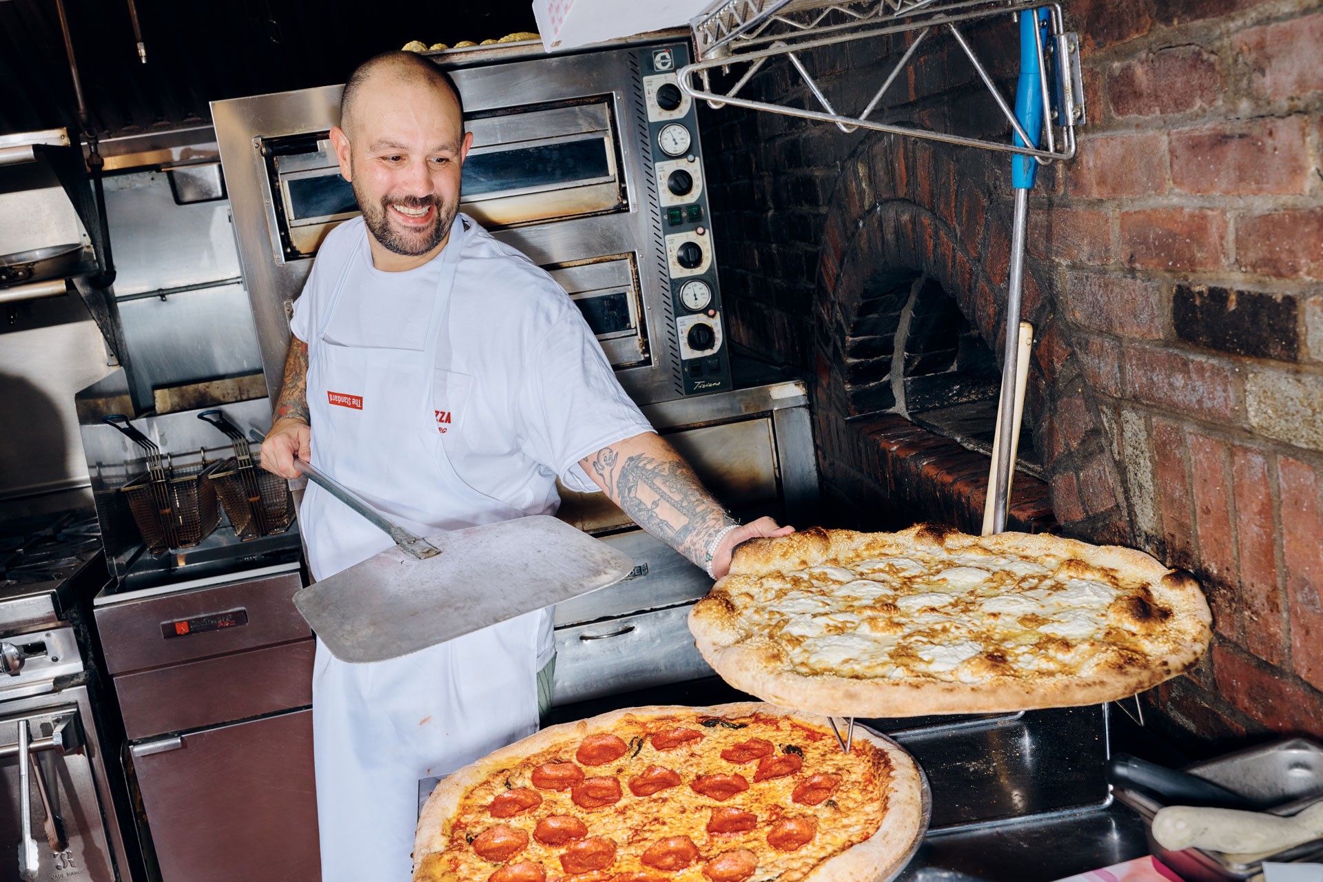 Man cooking pizza