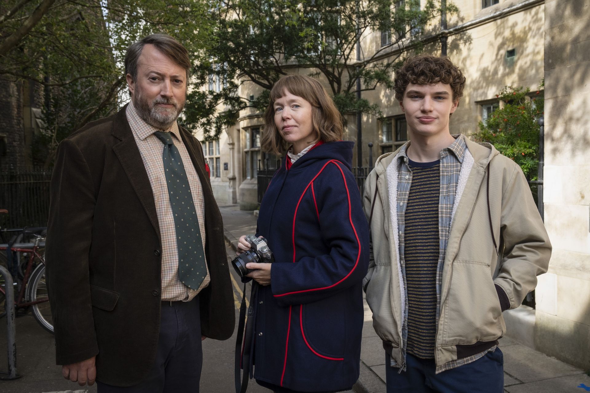John ‘Ludwig’ Taylor (DAVID MITCHELL), Lucy Betts-Taylor (ANNA MAXWELL MARTIN) & Henry Betts-Taylor (DYLAN HUGHES) in Ludwig series 2, coming to BBC One and iPlayer in August.