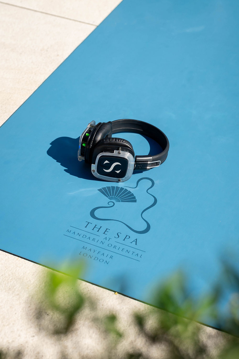 Headphones on a workout mat