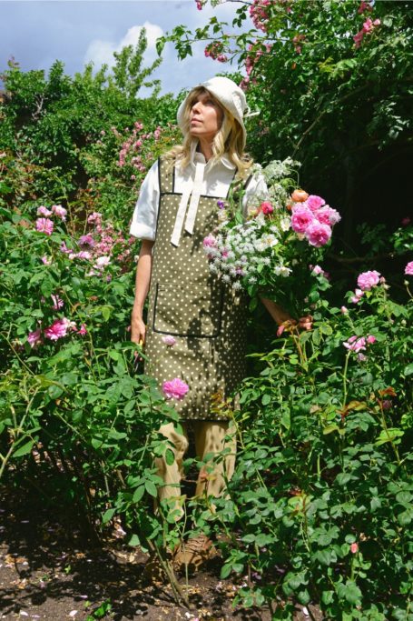 Woman wearing Sister Jane x Petersham Nurseries gardening clothes