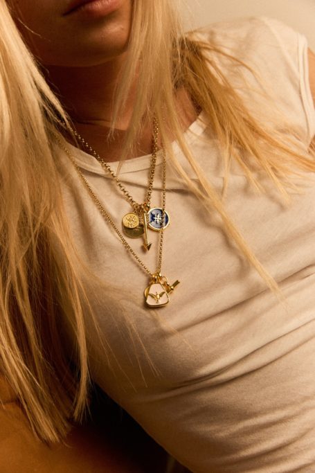 Woman wearing Tilly Sveaas charm necklace