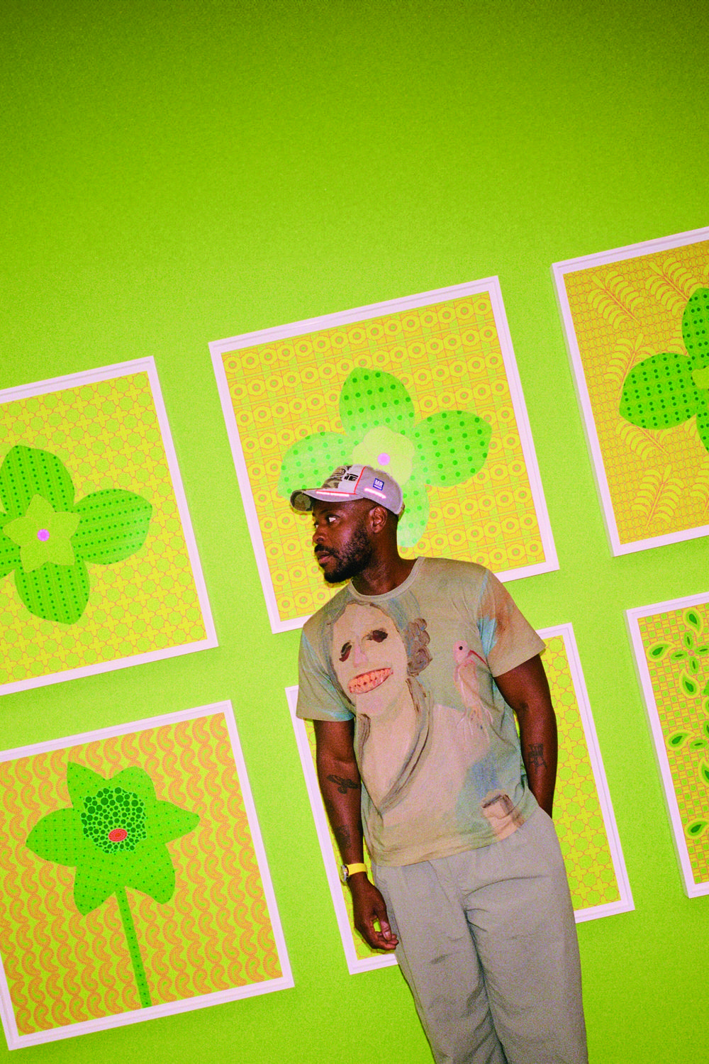 Yinka Ilori against a green background