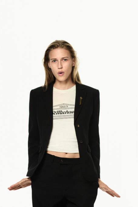 Woman wearing M&S x Aries t-shirt