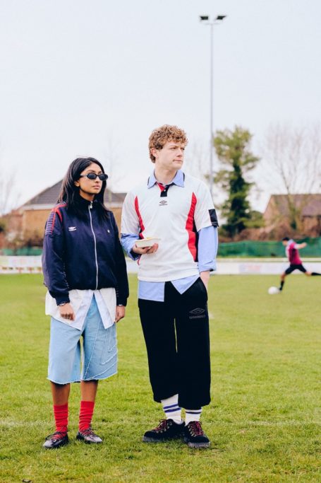 Woman and man in Umbro activewear
