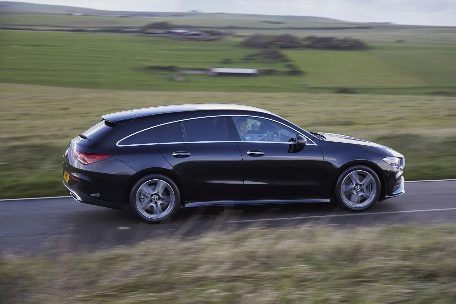 The Mercedes CLA Shooting Brake driving along a country road