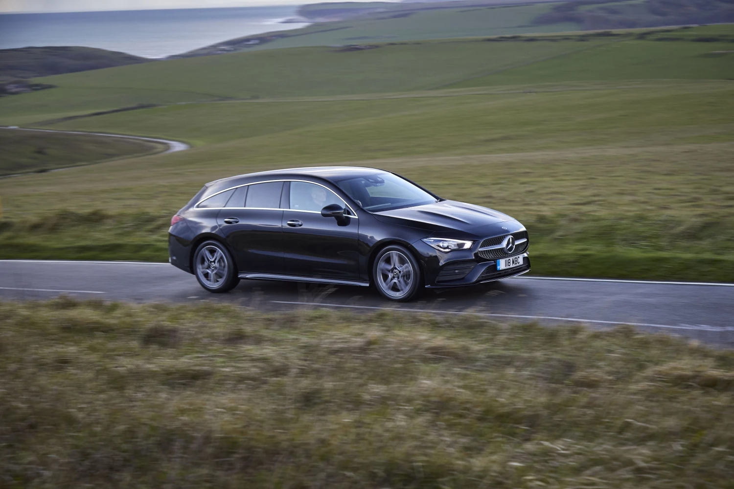 The Mercedes CLA Shooting Brake driving along a country road