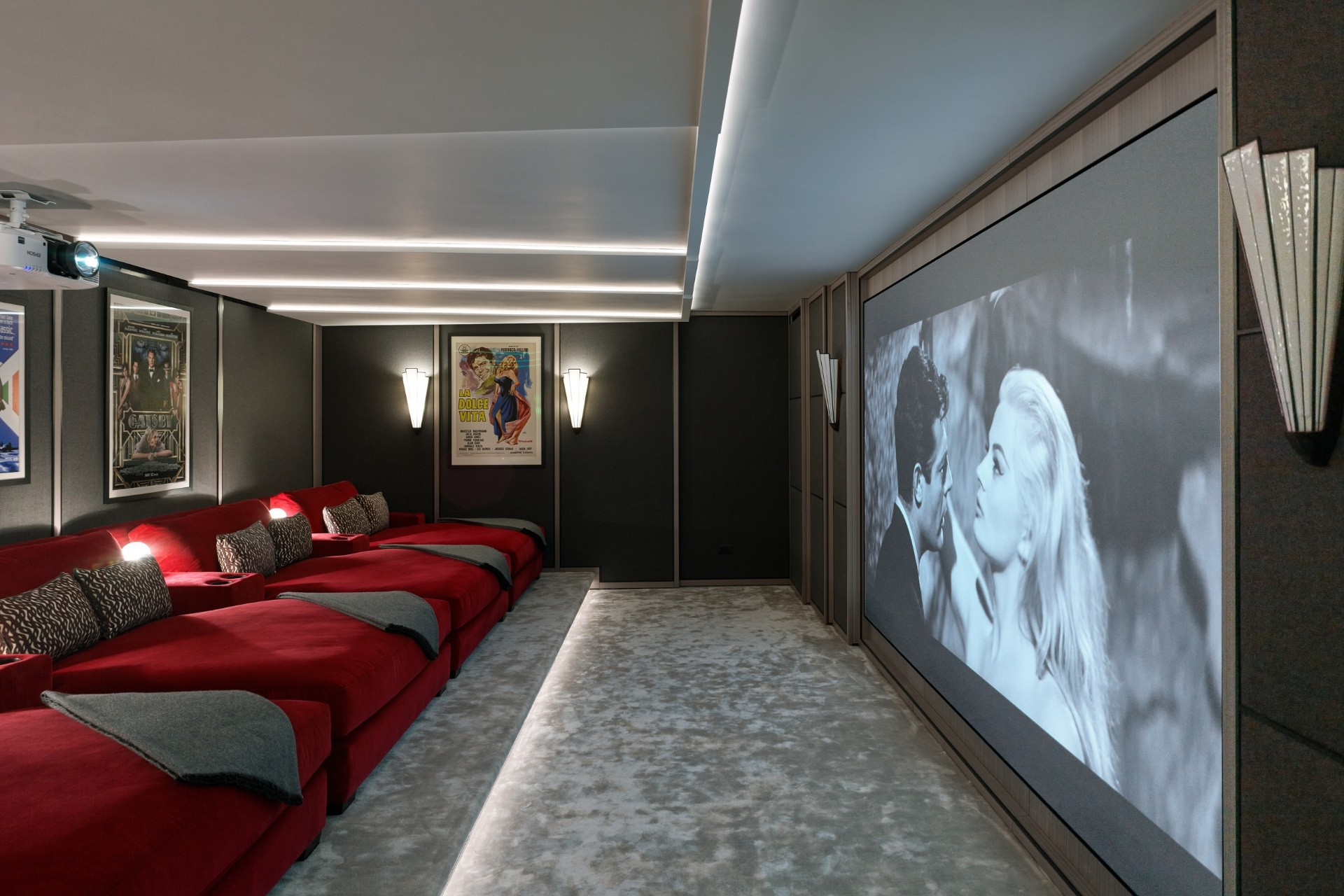 Cinema in Lake Como home designed by Thorp Design